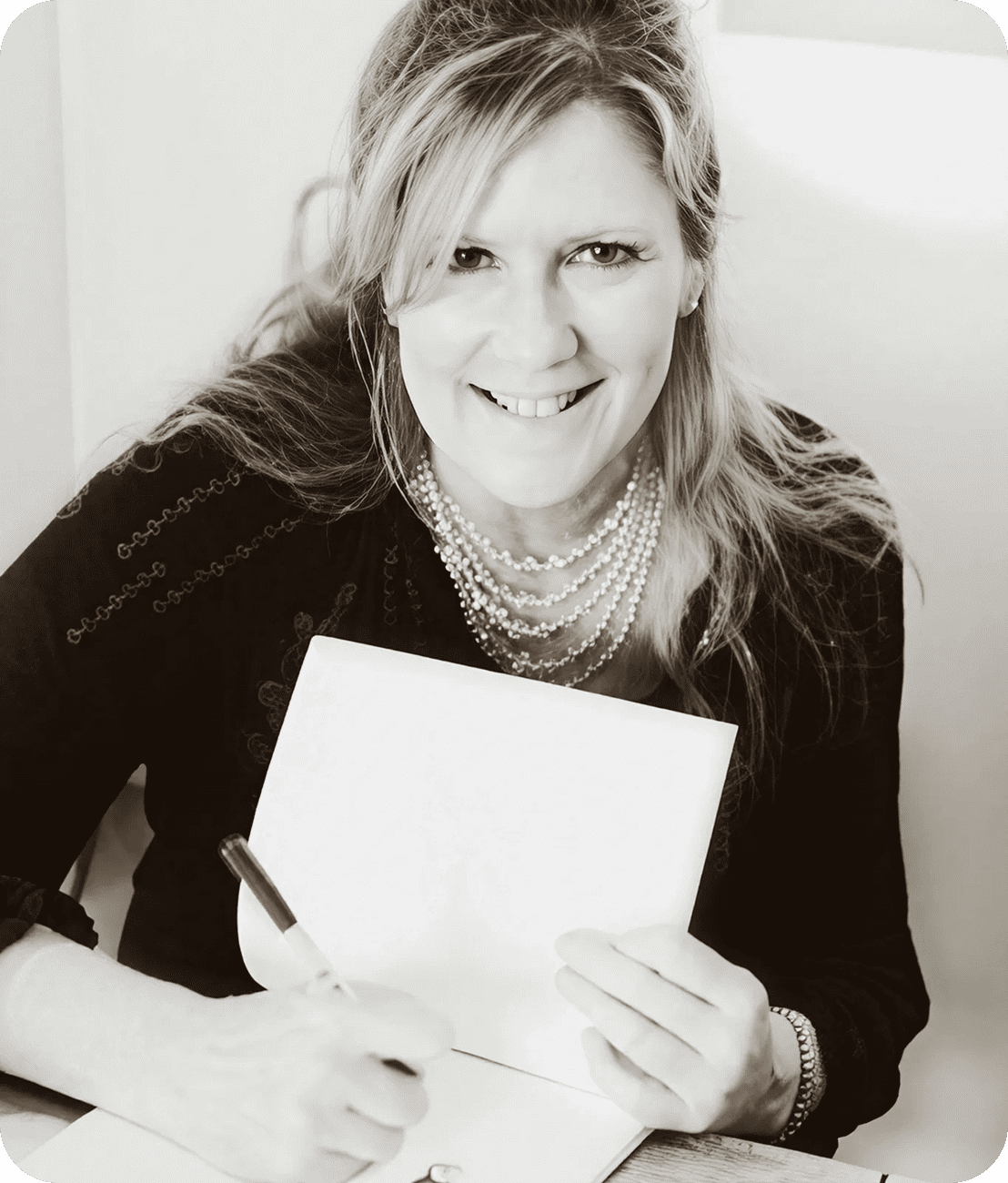 Author signing a book