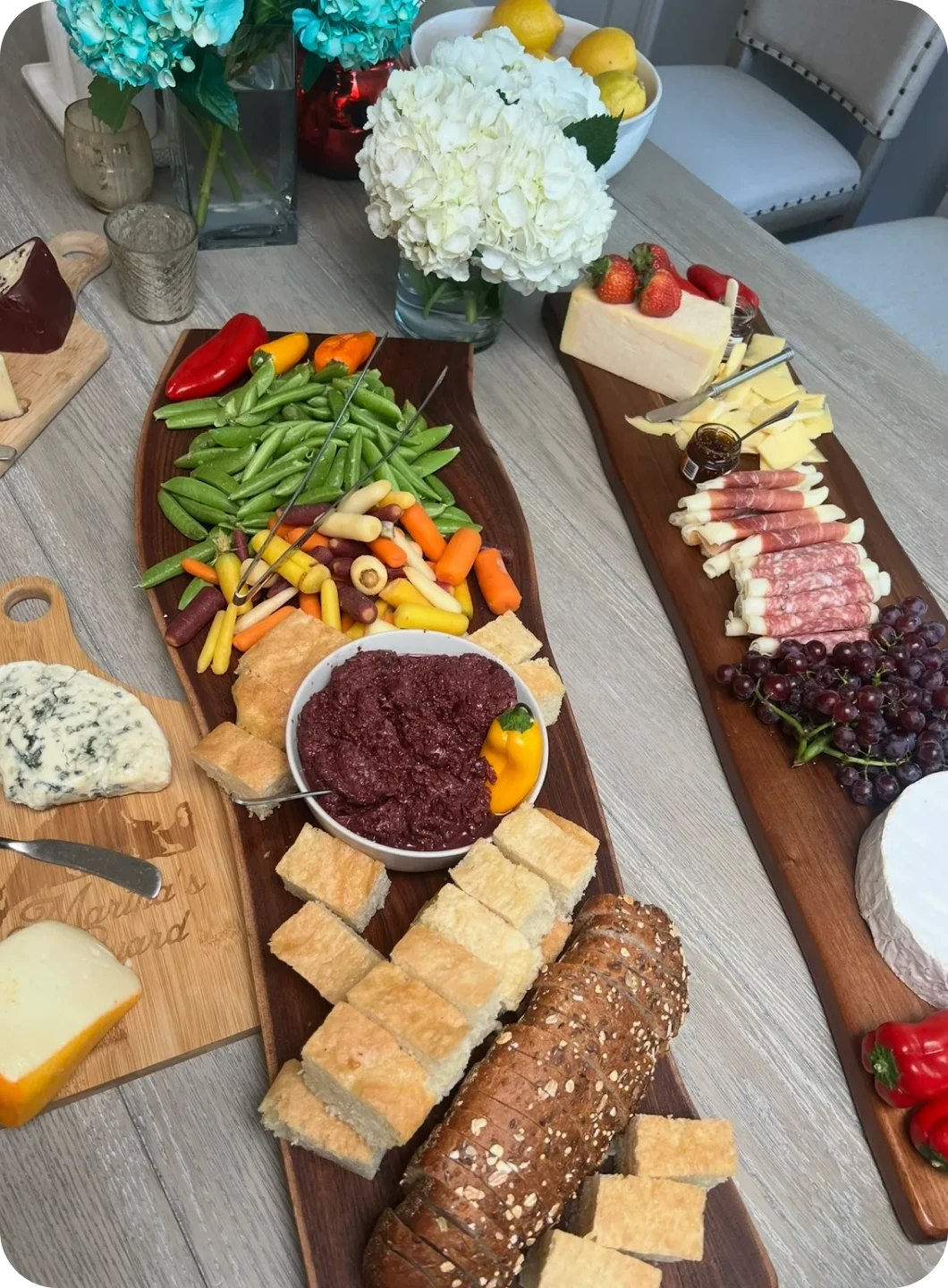 Vegetables and breads on wooden board