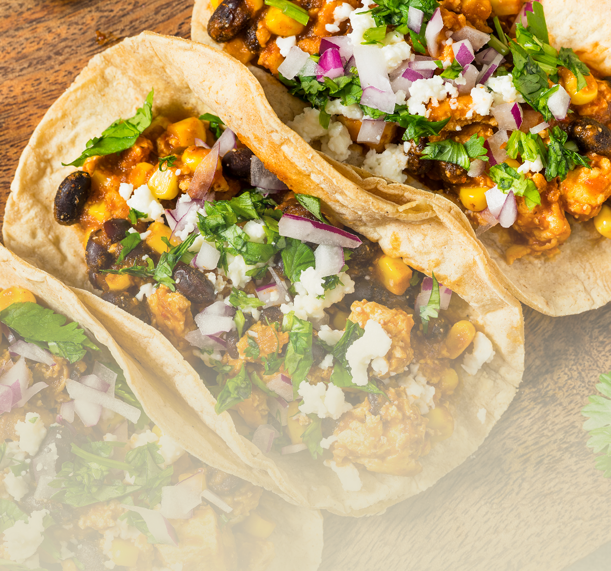 Vegetarian tacos on a wooden table