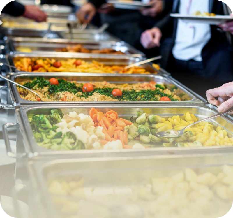 Variety of foods in buffet trays